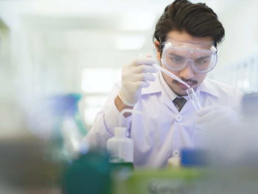 Collaborator sliding liquid in a test tube